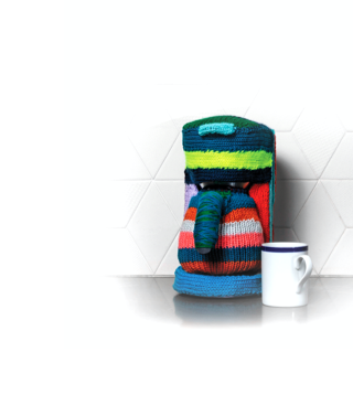 Coffee maker wrapped in yarn