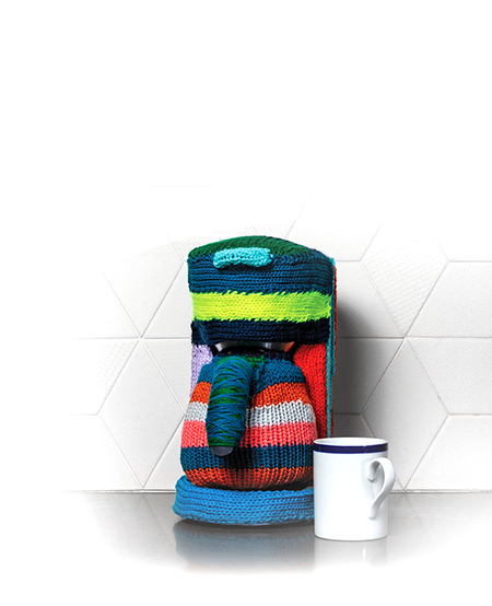 Coffee maker wrapped in yarn